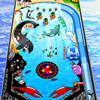 Pinball game in a happy tropical setting.