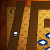 Move the ball along the track, for that you must balancing the track, moving  your cursor across the arrowbuttons.
